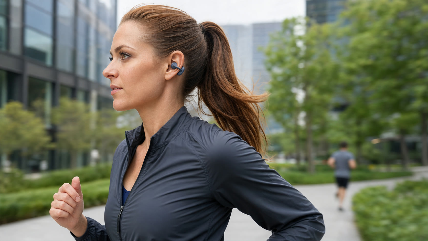 Office professional wearing the vivolight clip-on earphone concept during a lunchtime run.